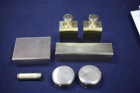 An early 20th century Cartier gilt metal mounted crocodile skin Doctors travelling toilet case